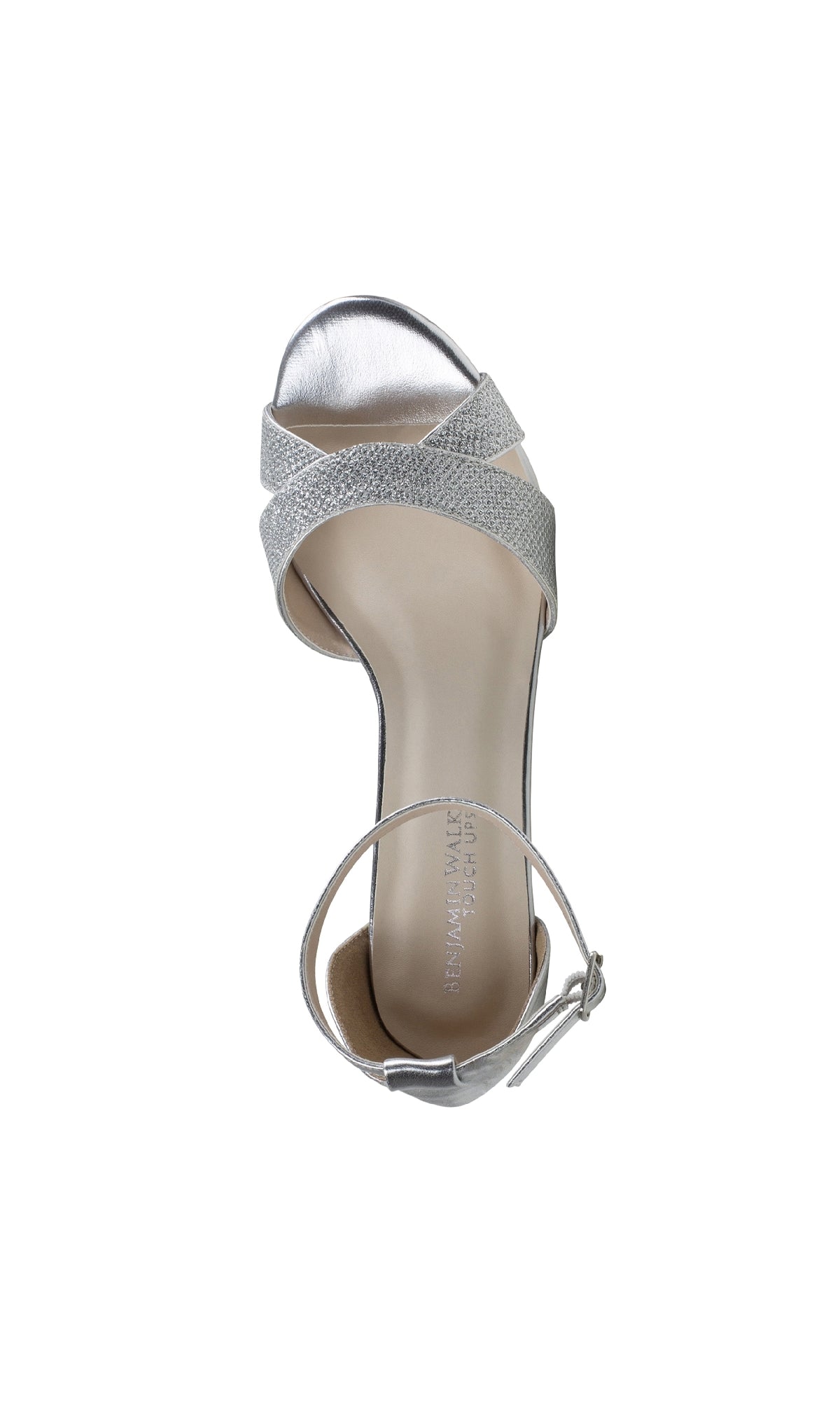 The Clementine Silver Glitter Prom Shoes (Touch Ups 4613) feature textured cross straps, a buckle ankle strap, and a chic low heel—perfect for prom or special occasions. Sparkling silver design shown from above on a white background.